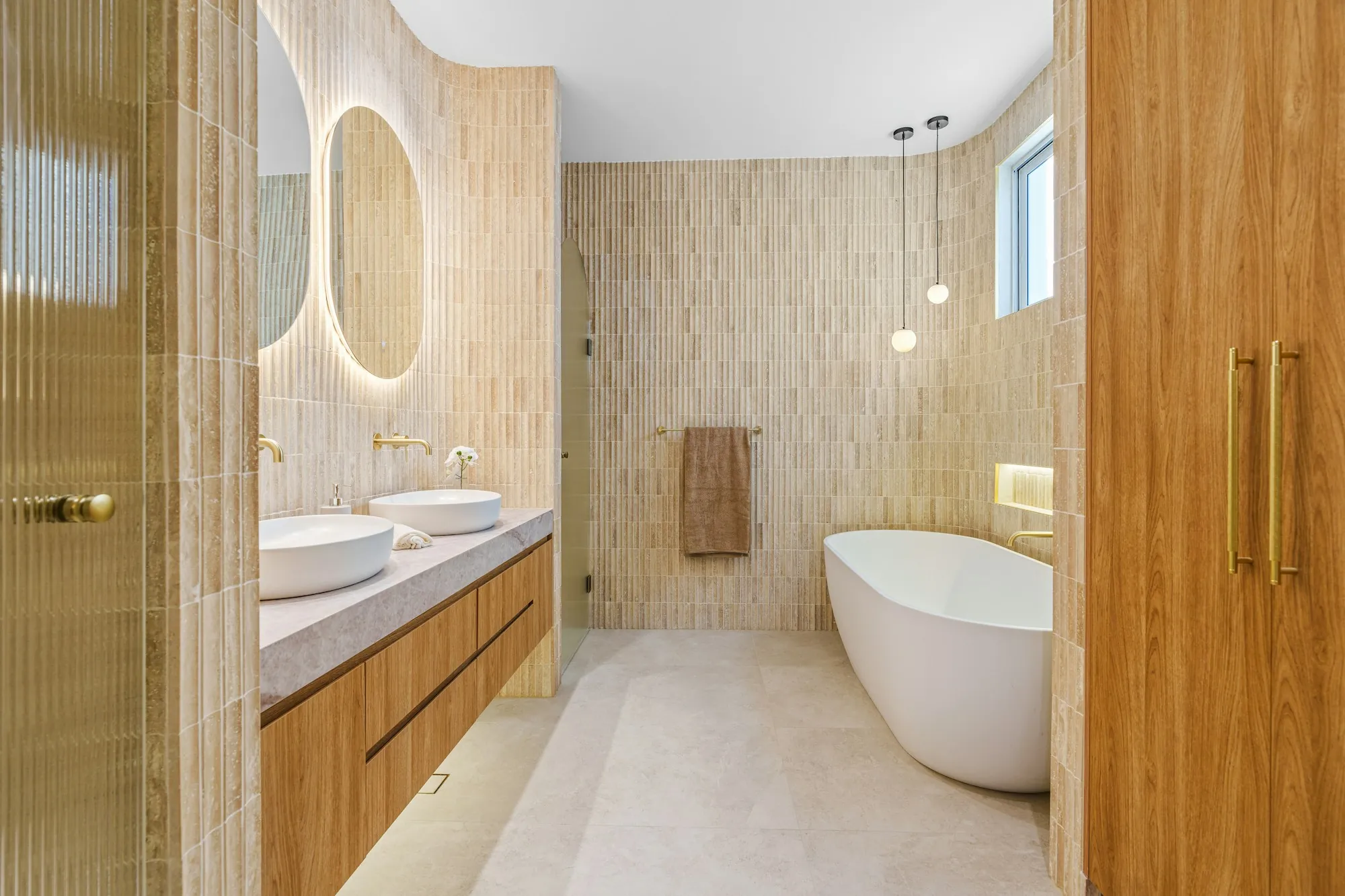 Remodeled bathroom with new tile and fixtures