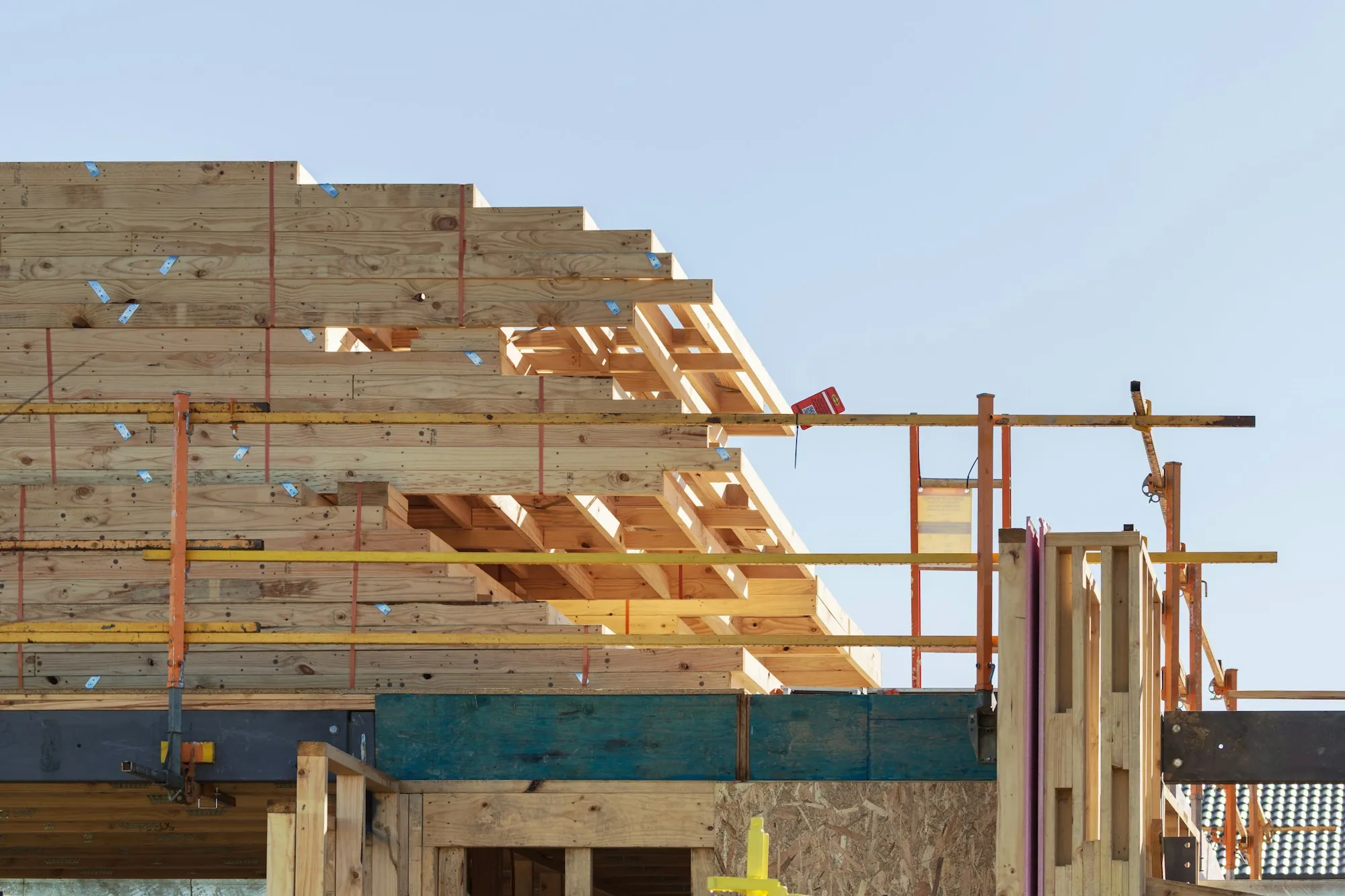 Roof framing going up on a house
